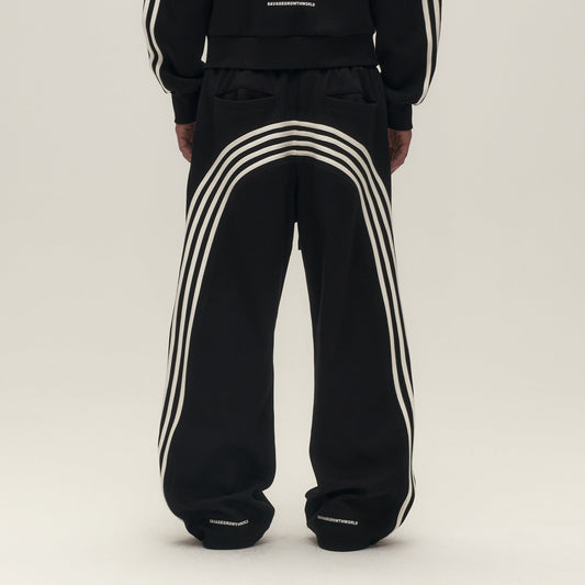 SAVAGEGROWTHWORLD Back-Arc Striped Graphic Track Pants