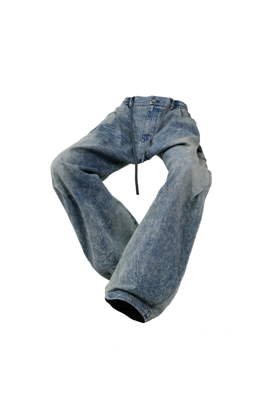 RELABEL Washed Curved-Blade Jeans