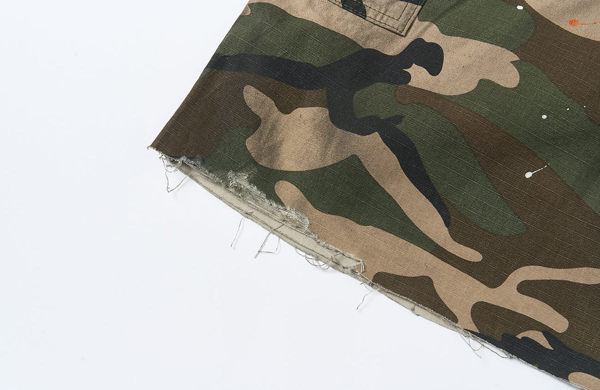 SAVAGEGROWTHWORLD Distressed Paint-Splatter Camo Shorts