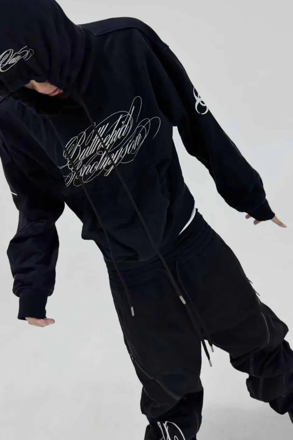 Multi Zip Calligraphy Sweatpants
