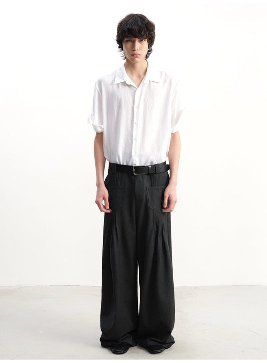 Wide-leg pants with pleated pockets