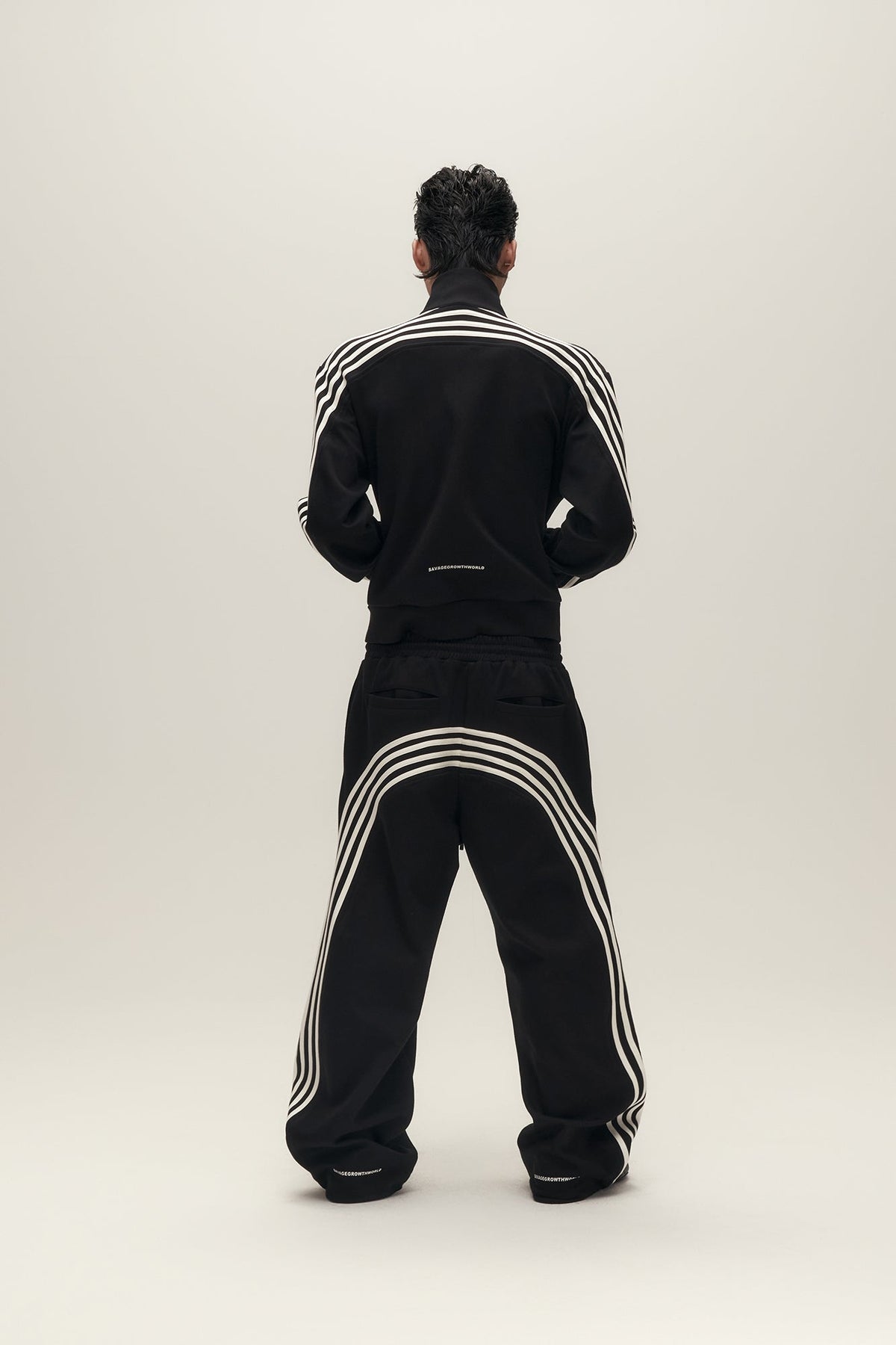SAVAGEGROWTHWORLD Back-Arc Striped Graphic Track Pants