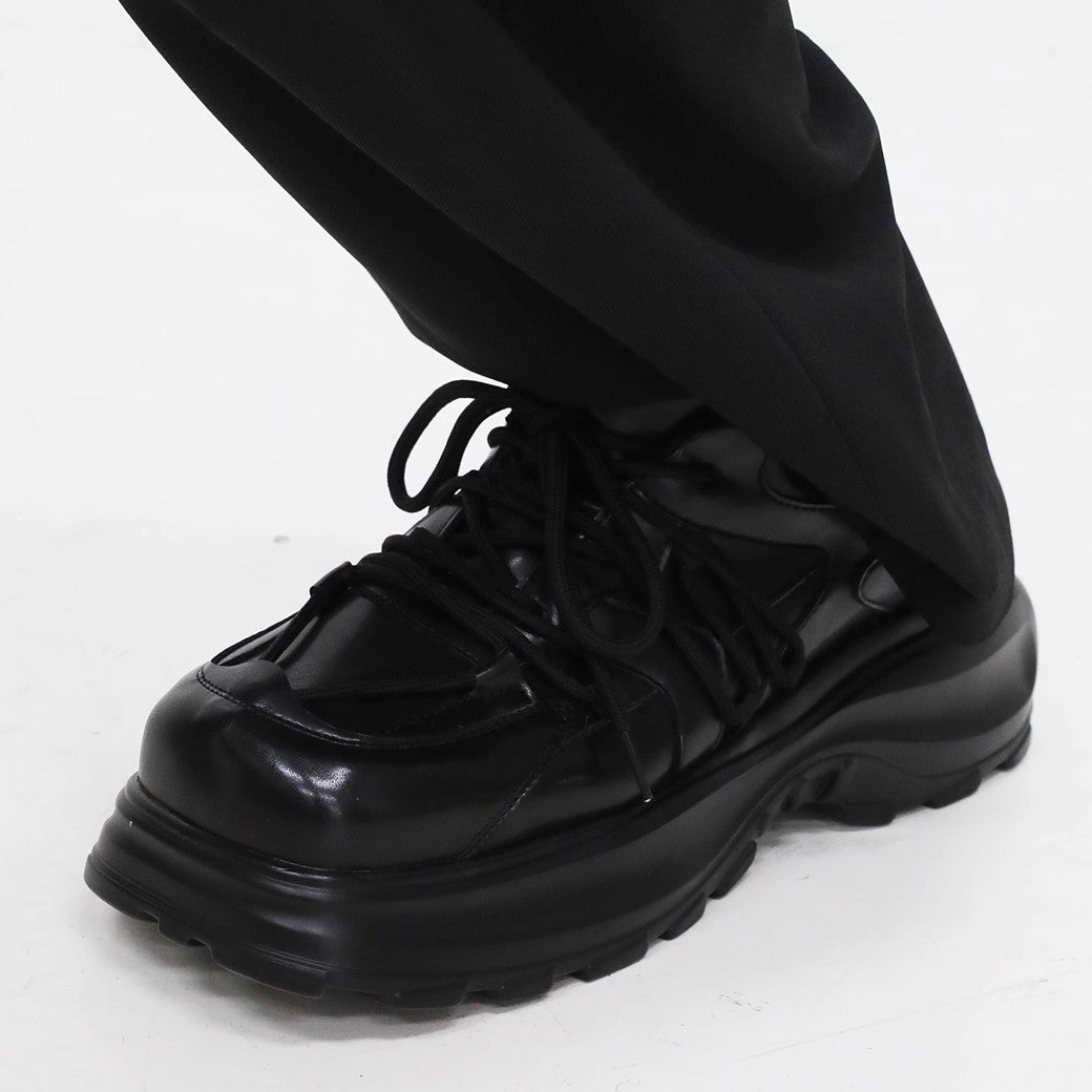 Simple black color thick sole silhouette leather sneakers