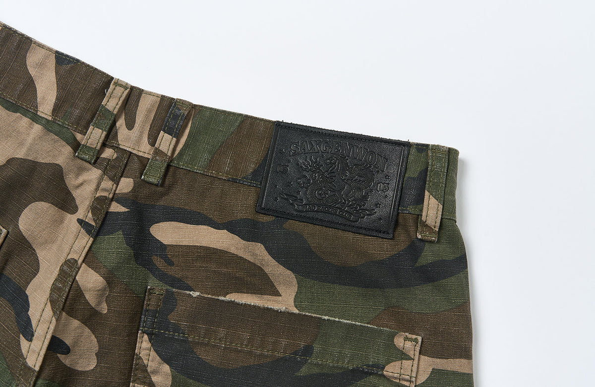 SAVAGEGROWTHWORLD Distressed Paint-Splatter Camo Shorts