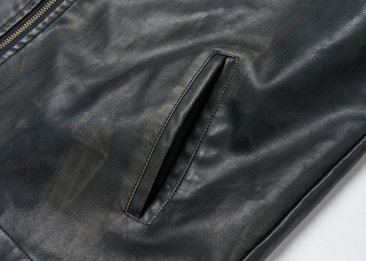 SAVAGEGROWTHWORLD Crossed Spliced Rivet Faux Leather Jacket