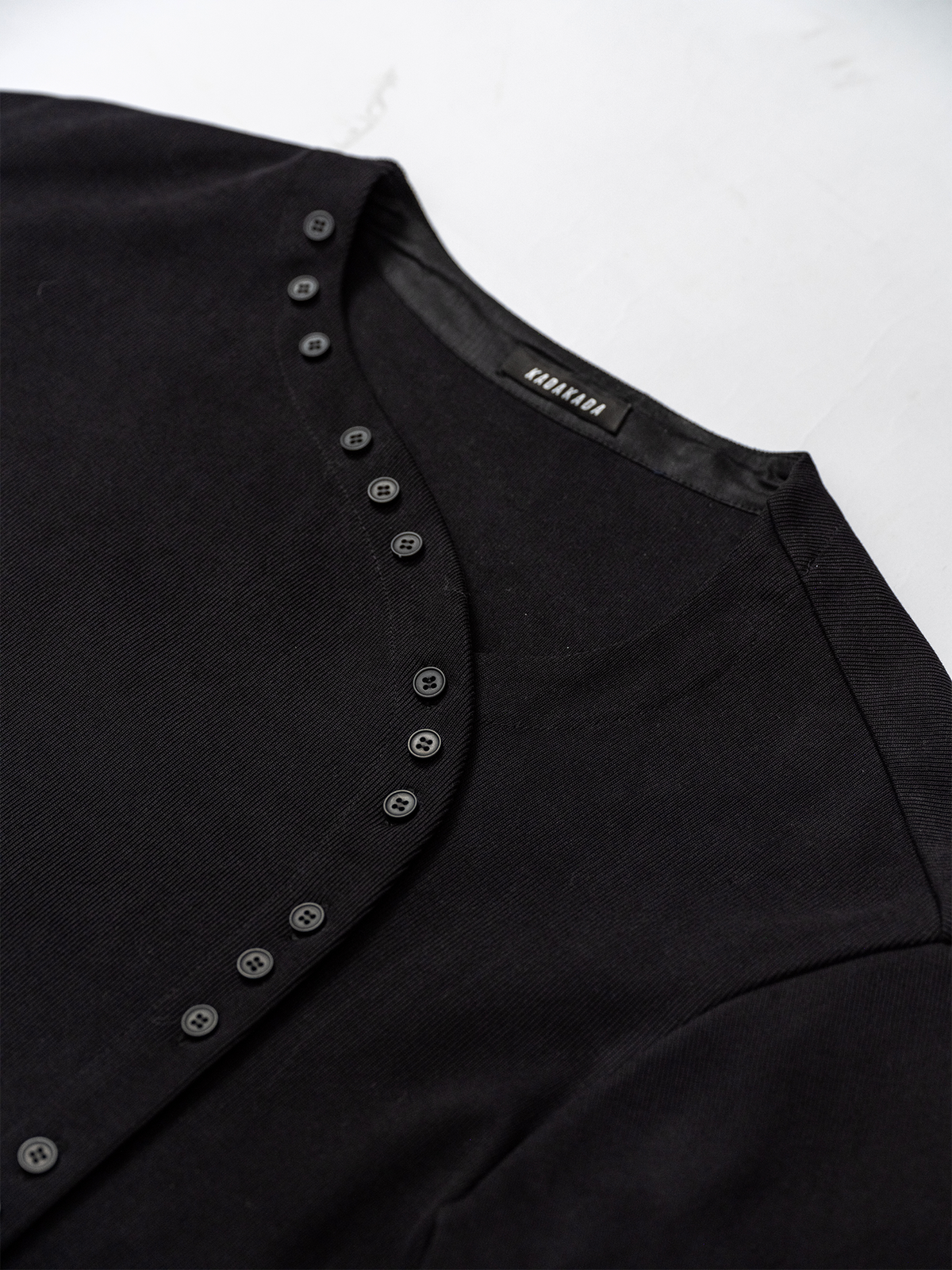 KADAKADA Buttoned Curved Placket Ribbed Knit Top