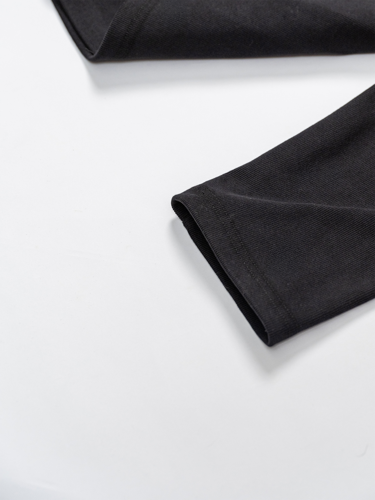 KADAKADA Buttoned Curved Placket Ribbed Knit Top