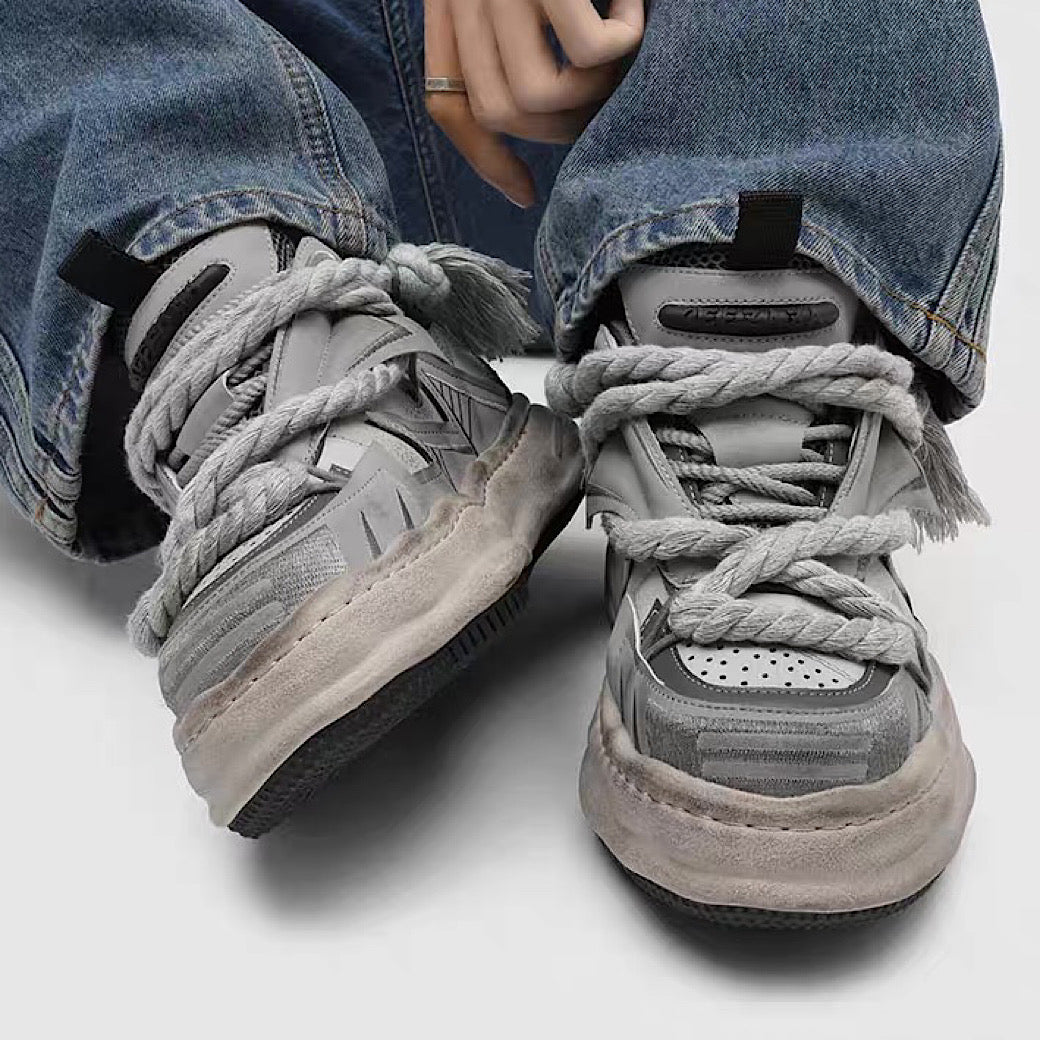 Multi-lace design muted color stained sneakers