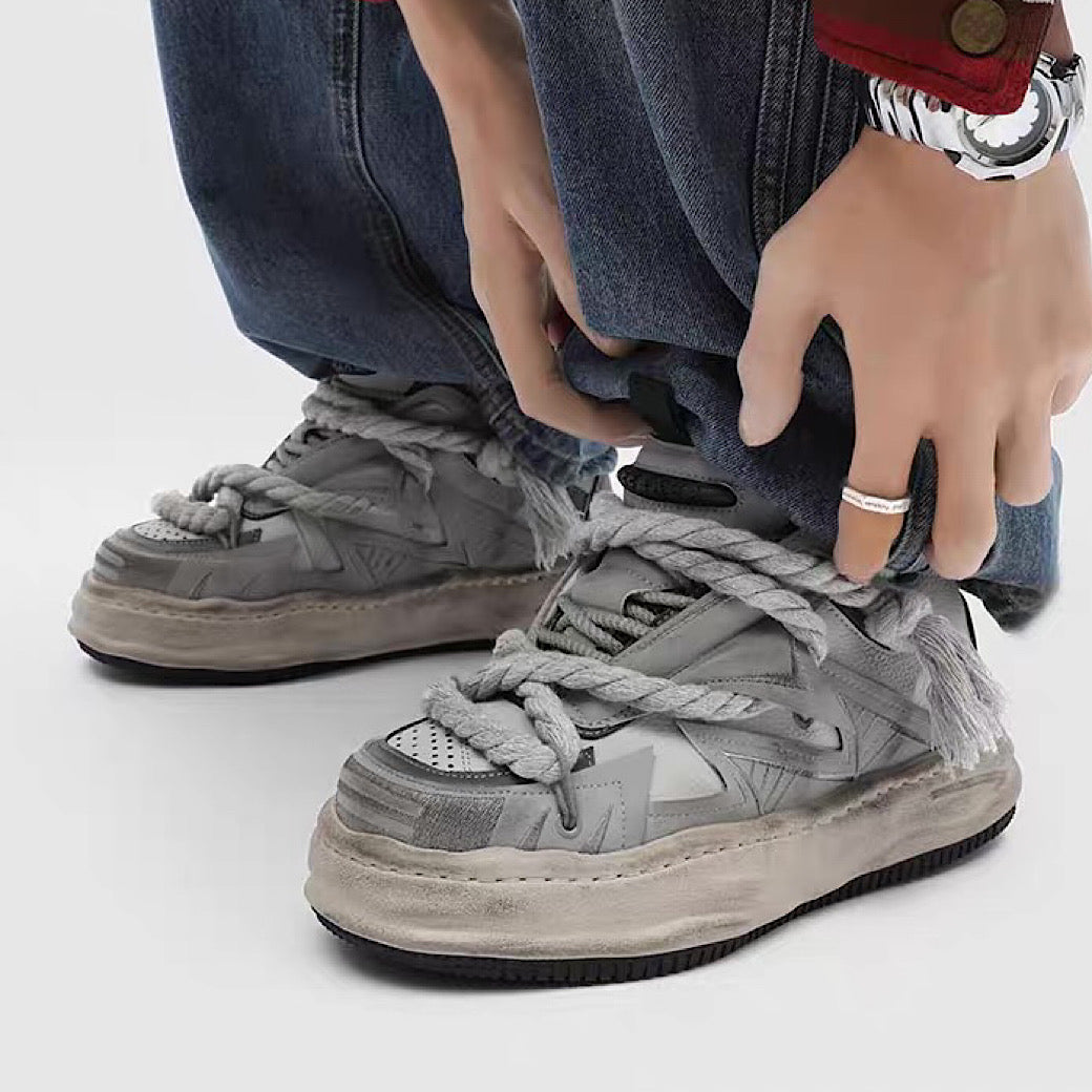 Multi-lace design muted color stained sneakers