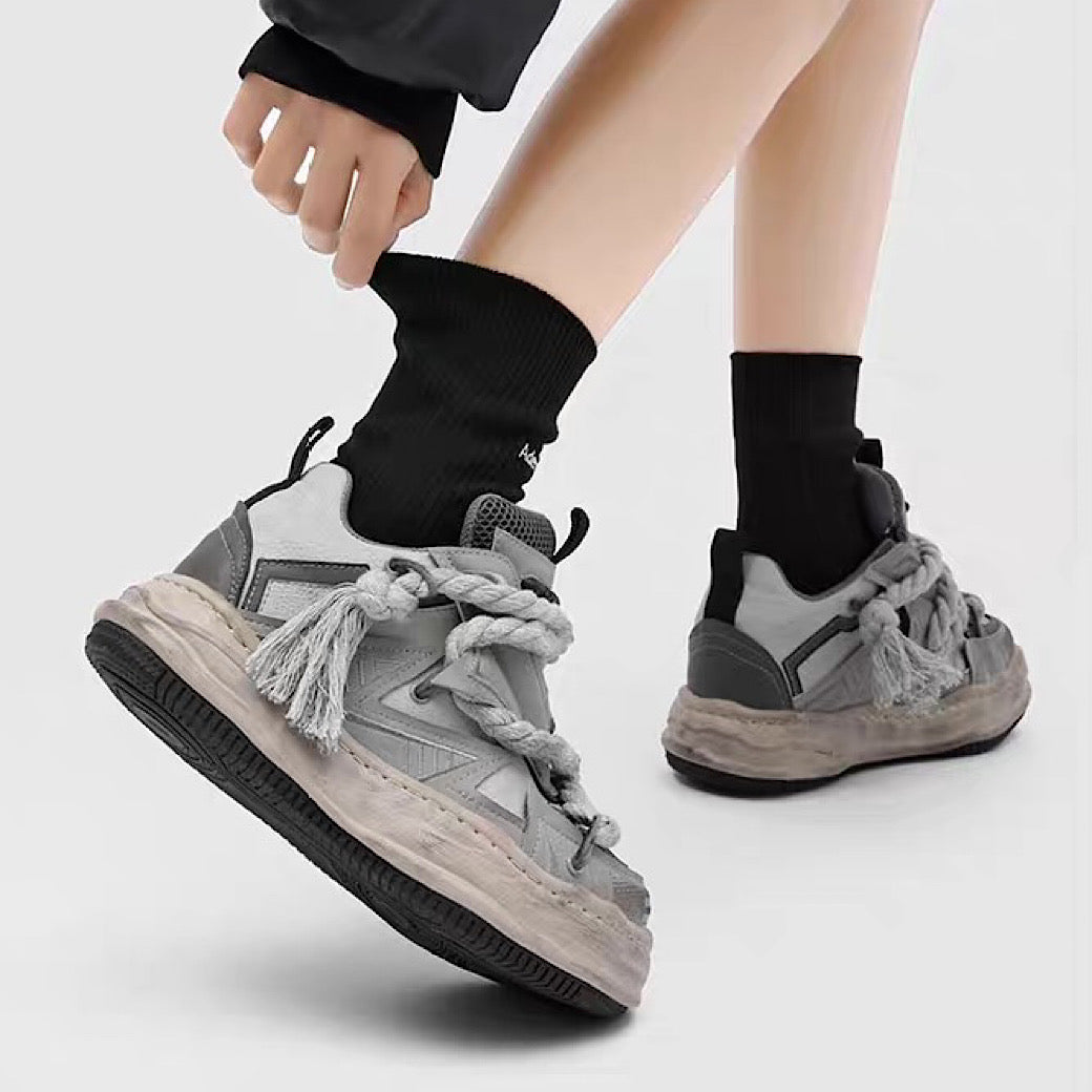 Multi-lace design muted color stained sneakers
