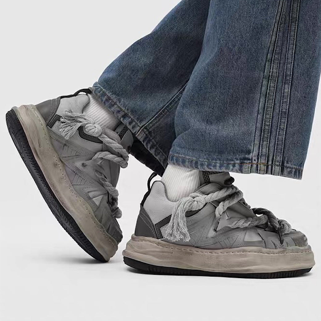 Multi-lace design muted color stained sneakers