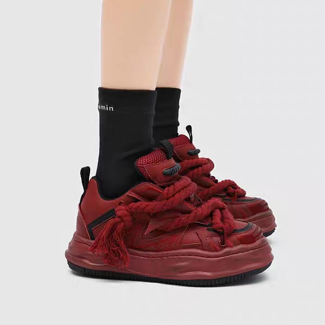 Multi-lace design muted color stained sneakers