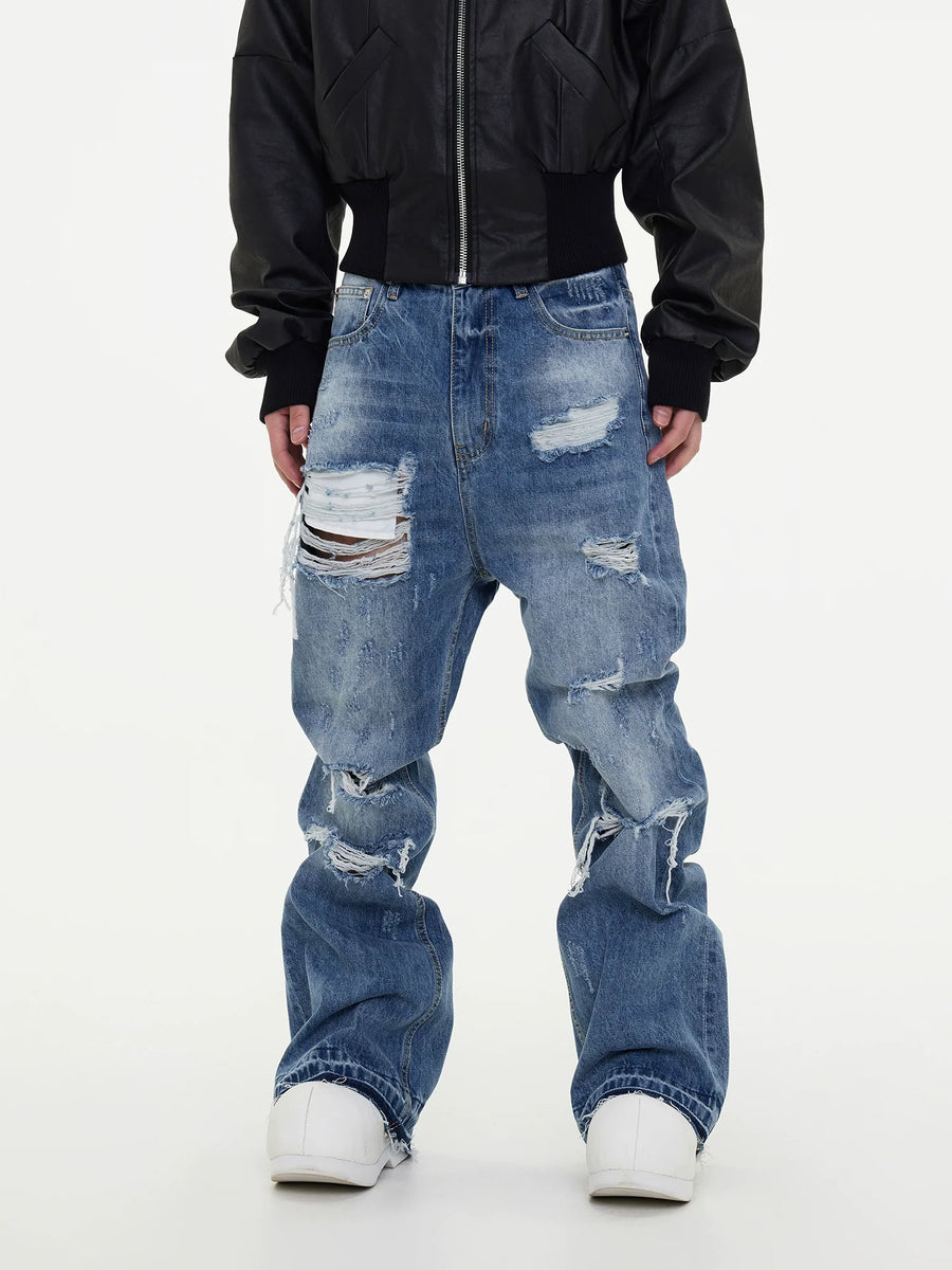Ripped Damage Fringe Raw Hem Stacked Micro Flare Denim Jeans