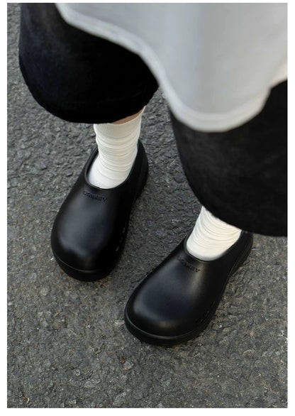 Midnight Wave Platform Clogs