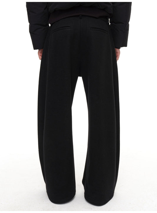 Diagonal-front pleated wool pants