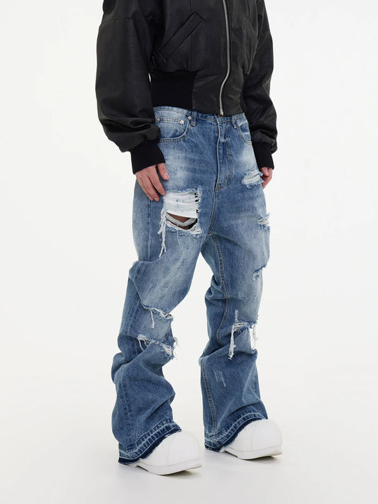 Ripped Damage Fringe Raw Hem Stacked Micro Flare Denim Jeans