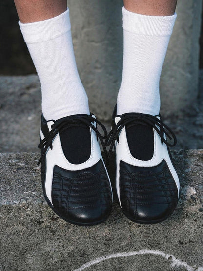 Black Quilted-Panel Flat-Sole Sneakers