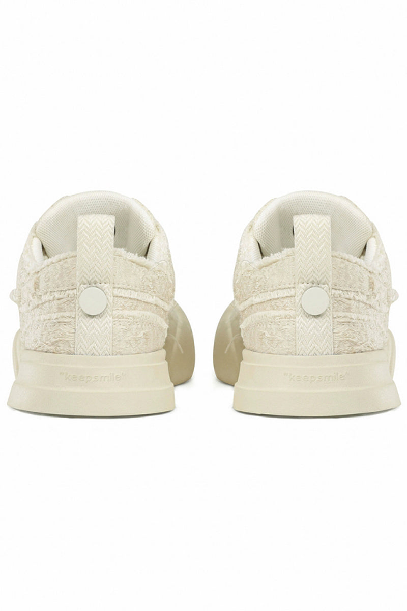 Cream Textured Low-Top Sneaker