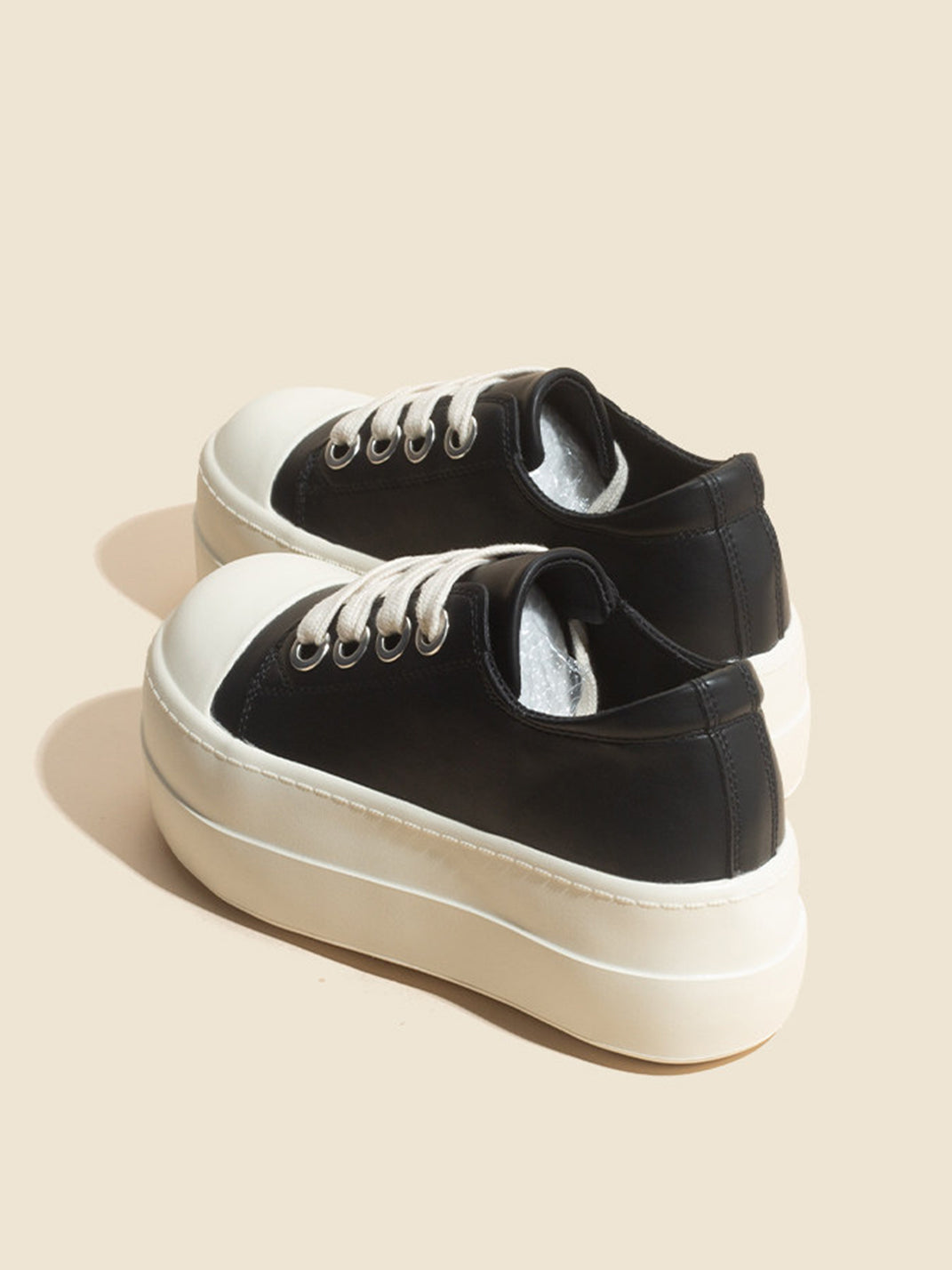 Oversized-Toe High-Low Platform Trainers