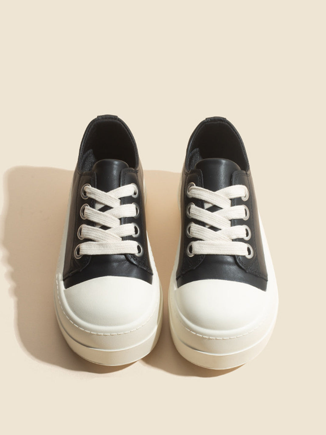 Oversized-Toe High-Low Platform Trainers